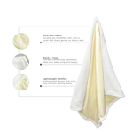 Close-up of beige baby blanket highlighting ultra-soft fabric, warm sherpa lining, and lightweight comfort features.