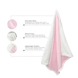 Close-up of pink baby blanket highlighting ultra-soft fabric, warm sherpa lining, and lightweight comfort features.