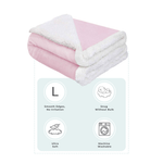Pink baby blanket with smooth edges, ultra-soft feel, snug warmth without bulk, and machine-washable design.