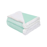 Folded Turquoise luxury baby blanket showing thick plush top and cozy sherpa lining for warmth and comfort.